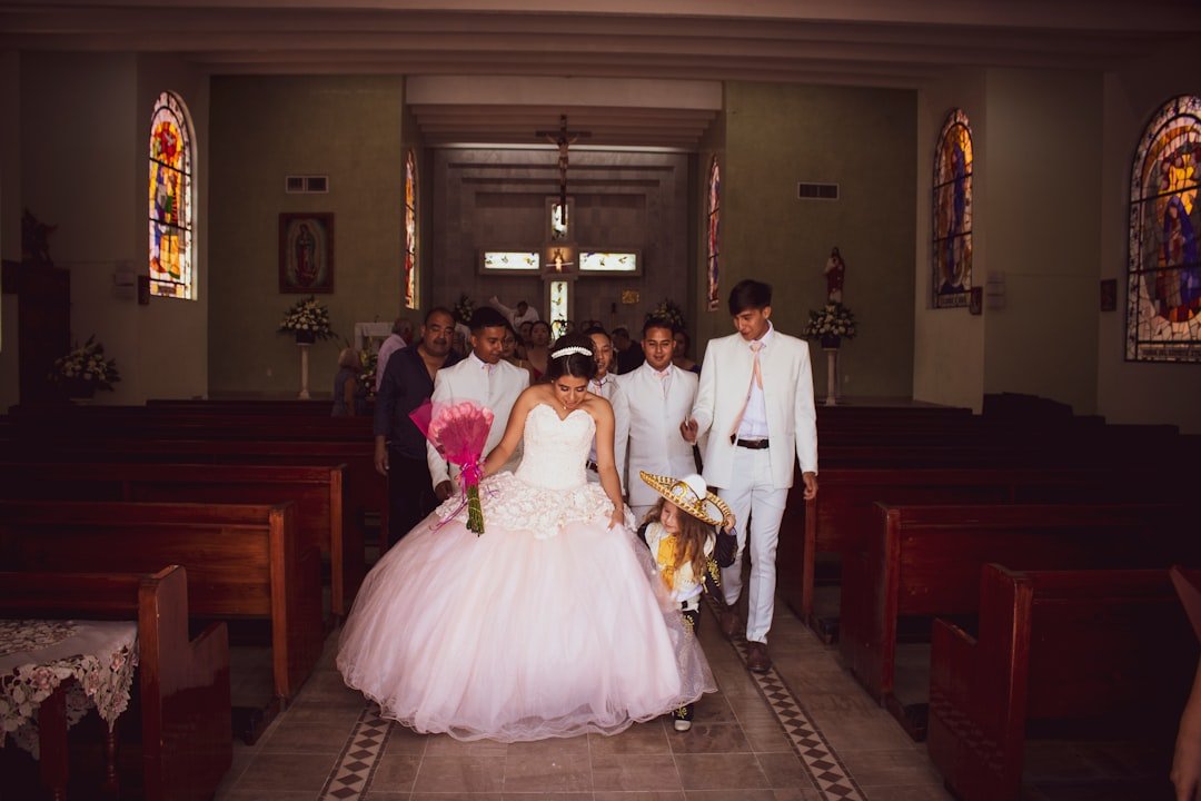 woman holding flower in church