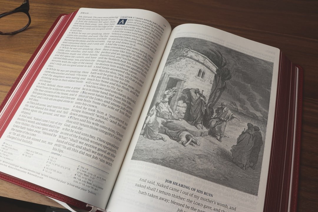 white book page on brown wooden table