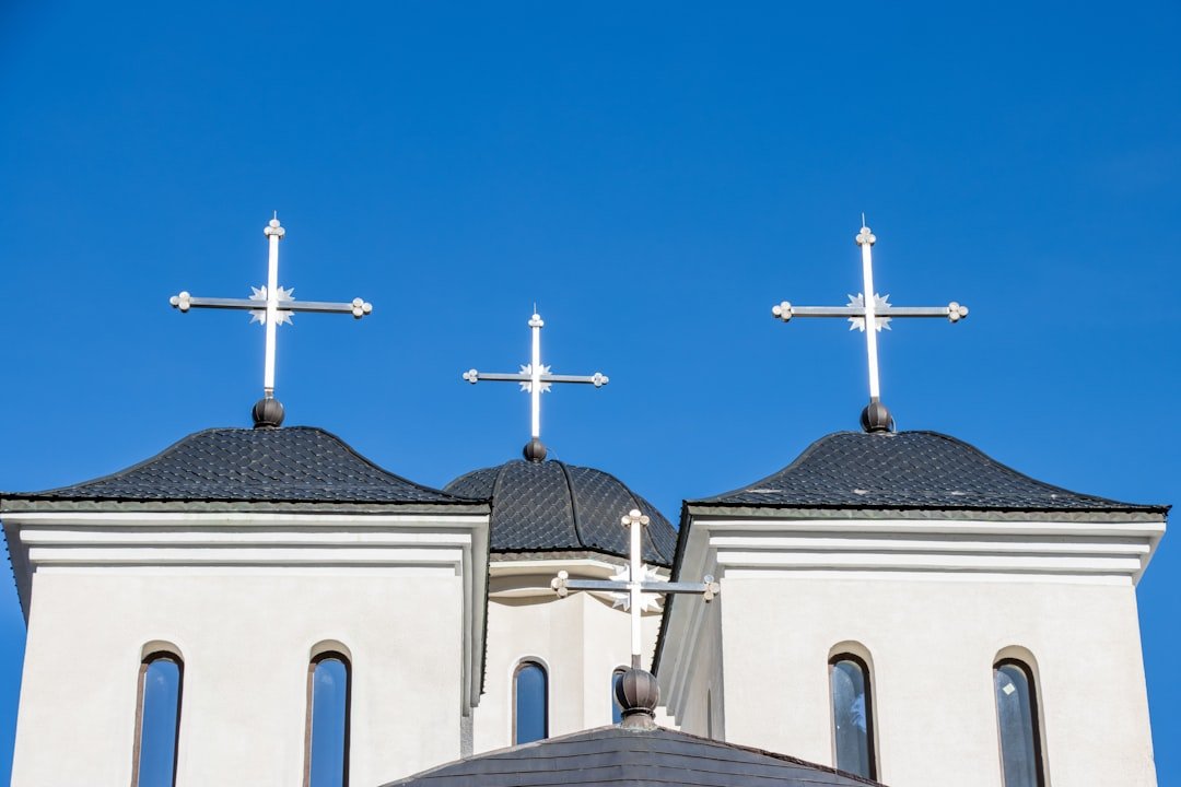 A church with three crosses on top of it